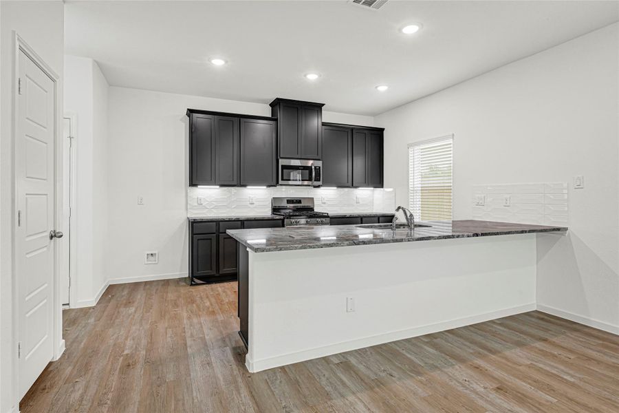 Furnished interior view inside a new home in Rollingbrook Estates, Baytown (Image 10). Furnished interior view inside a new home in Rollingbrook Estates, Baytown (Image 10).