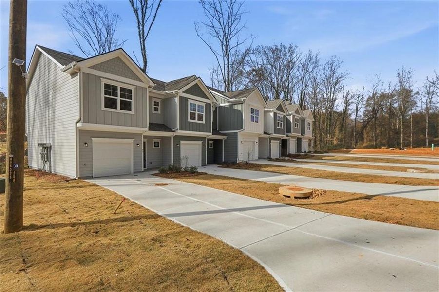 Front exterior of a new home in , Lavonia, GA, highlighting curb appeal (Image 18).