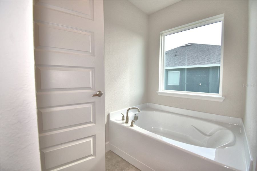 Furnished interior view inside a new home in Cadence Crossing, Auburndale (Image 11).