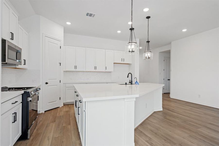 This kitchen is not only a functional space but also has ample storage. Whether you're a seasoned chef or just love to gather and enjoy good food, this kitchen is a dream come true.