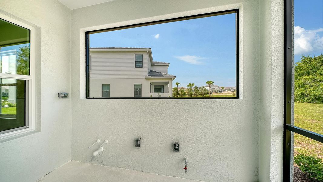 Exterior details and patio area of a home in Grand Park Real Estate and Homes for Sale in Sarasota, FL - Neal Communities, Sarasota (Image 28).