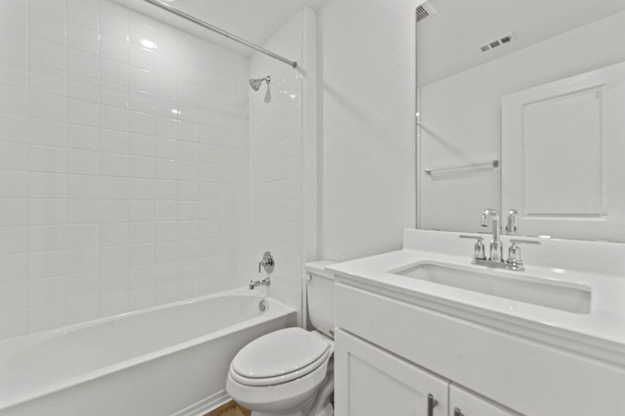 Furnished interior view inside a new home in Palomino, Manor (Image 9).