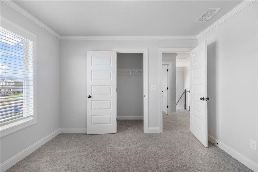 Spacious, unfurnished interior of a new home in Calgary Downs, Winder (Image 26).