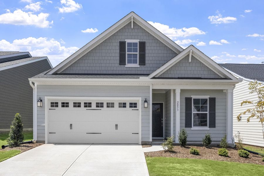Front exterior of a new home in Six Oaks, Summerville, SC, highlighting curb appeal (Image 1). Front exterior of a new home in Six Oaks, Summerville, SC, highlighting curb appeal (Image 1).