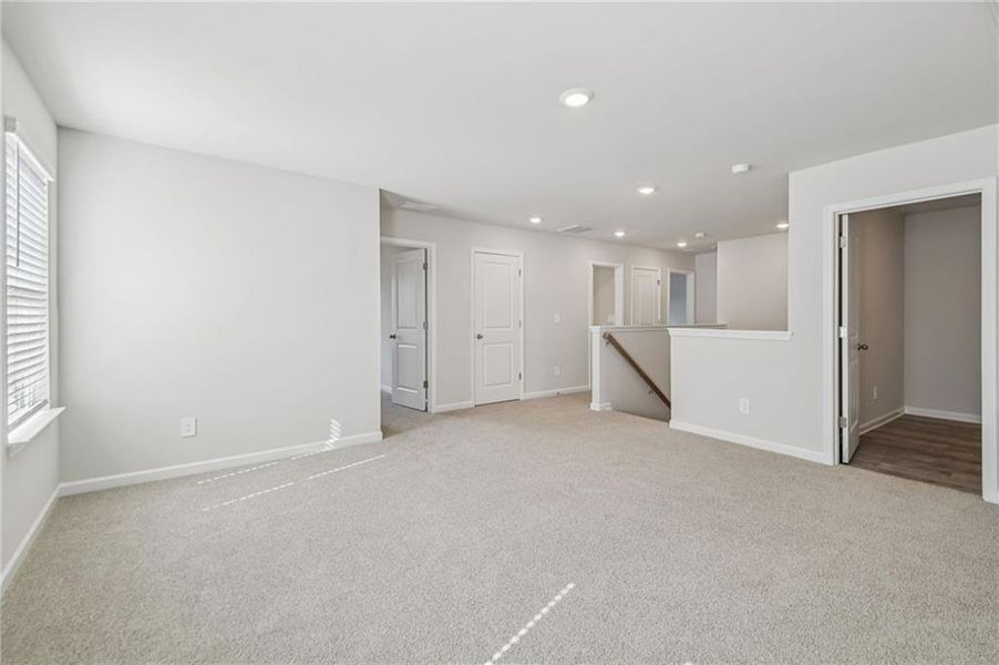 Spacious, unfurnished interior of a new home in Creekside at Oxford Park, Fairburn (Image 55).