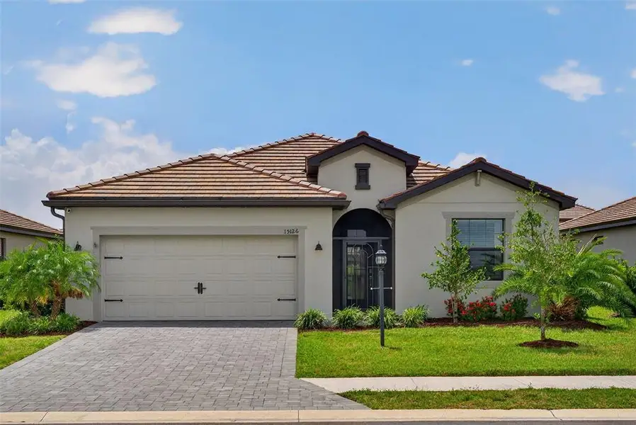 Front exterior of a new home in , Bradenton, FL, highlighting curb appeal (Image 30). Front exterior of a new home in , Bradenton, FL, highlighting curb appeal (Image 30).