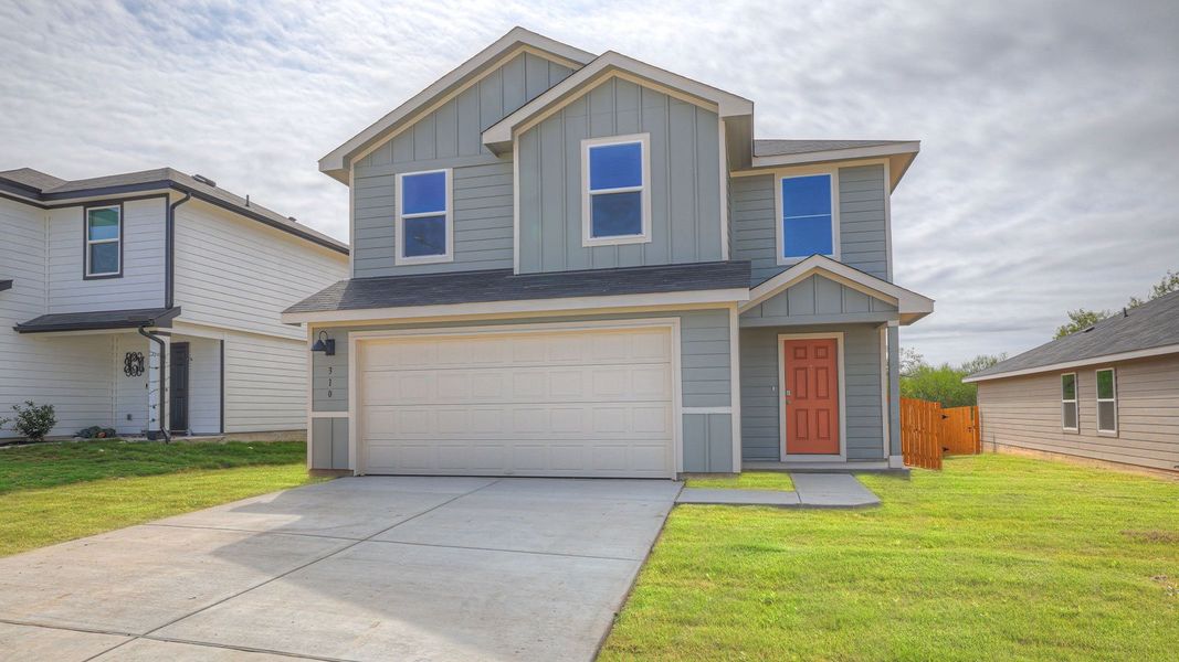 Front exterior of a new home in Ladera, Luling, TX, highlighting curb appeal (Image 1).