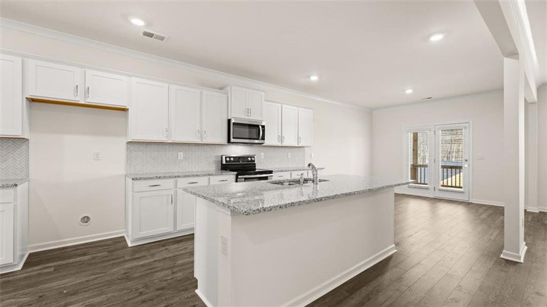 Furnished interior view inside a new home in Jackson Landing, Jefferson (Image 1).