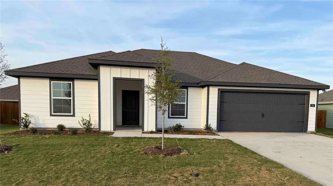 Front exterior of a new home in Waverly Estates, Josephine, TX, highlighting curb appeal (Image 2). Front exterior of a new home in Waverly Estates, Josephine, TX, highlighting curb appeal (Image 2).