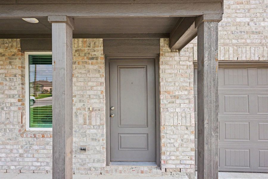 Exterior details and patio area of a home in Hill and Dale Ranch, Splendora (Image 4).