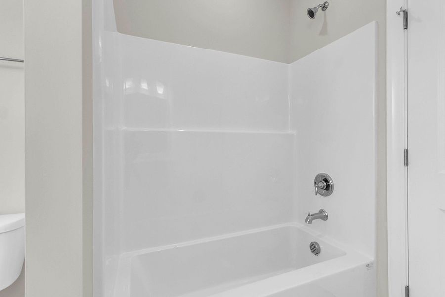 Furnished interior view inside a new home in Tidewater at Lakes of Cane Bay, Summerville (Image 8).