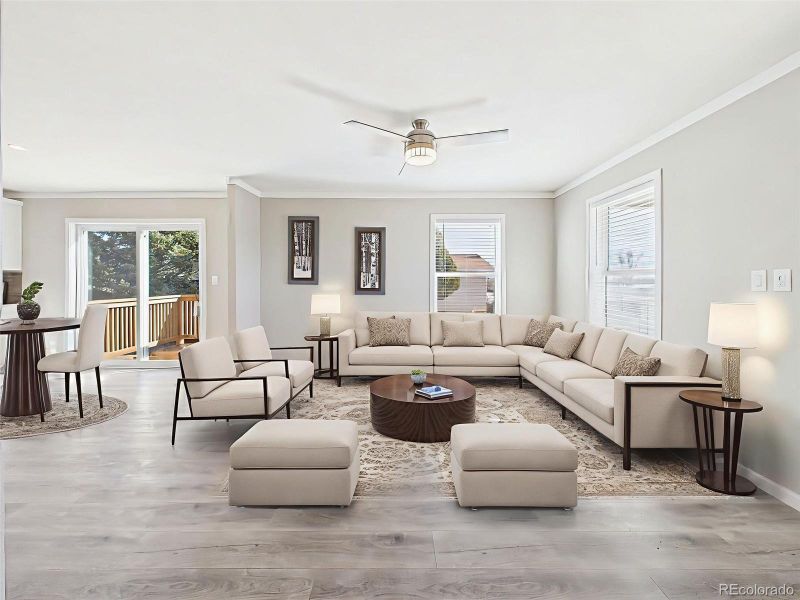 Virtually Staged Family Room – Shown here with a large sectional and accent seating, this family room layout showcases its capacity for comfort and connection.