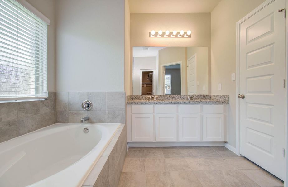 Furnished interior view inside a new home in Legends Bay, Baytown (Image 13).