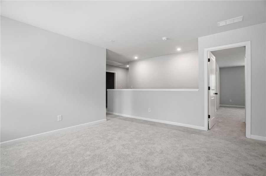 Spacious, unfurnished interior of a new home in Berkeley Mill, Cumming (Image 28).