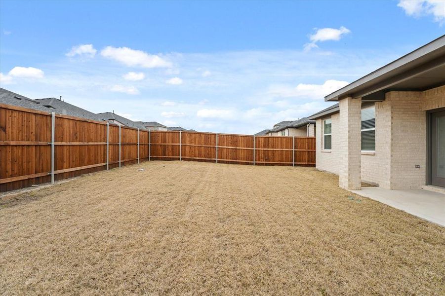 View of yard with a patio area