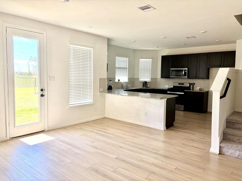 Furnished interior view inside a new home in Sunterra, Katy (Image 3).
