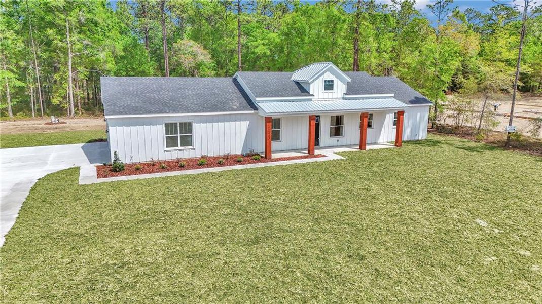 Front exterior of a new home in , Ocala, FL, highlighting curb appeal (Image 26).