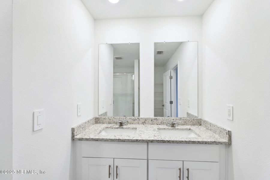 Furnished interior view inside a new home in Lakes at Bella Lago - Signature Series, Green Cove Springs (Image 4). Furnished interior view inside a new home in Lakes at Bella Lago - Signature Series, Green Cove Springs (Image 4).