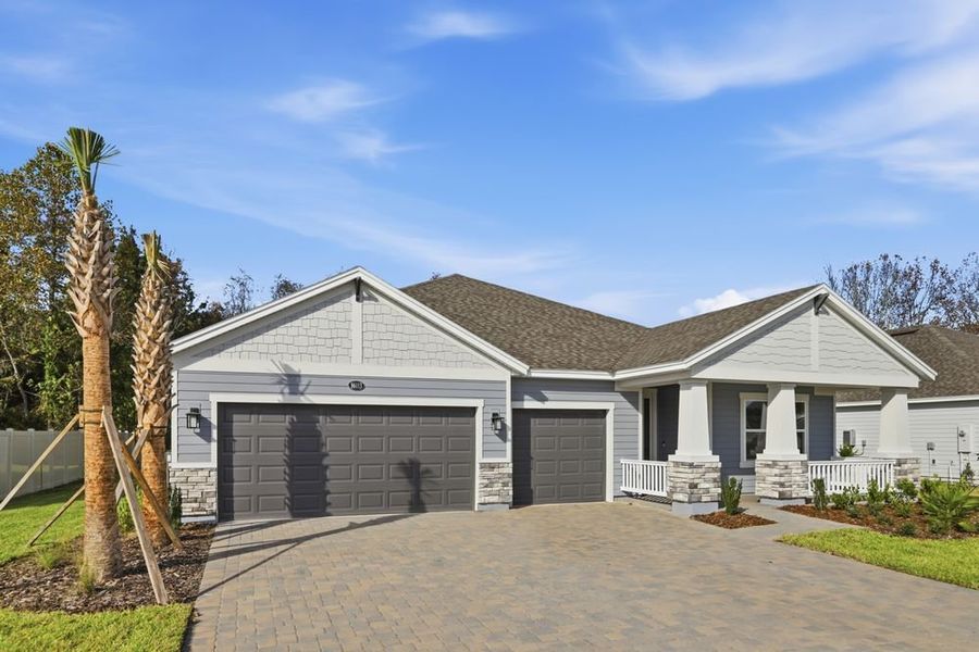 Front exterior of a new home in Headwaters at Lofton Creek, Yulee, FL, highlighting curb appeal (Image 20).