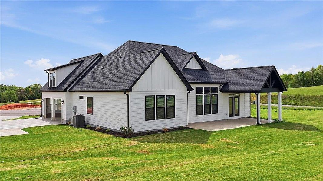 Front exterior of a new home in Sky View, Columbus, NC, highlighting curb appeal (Image 20).