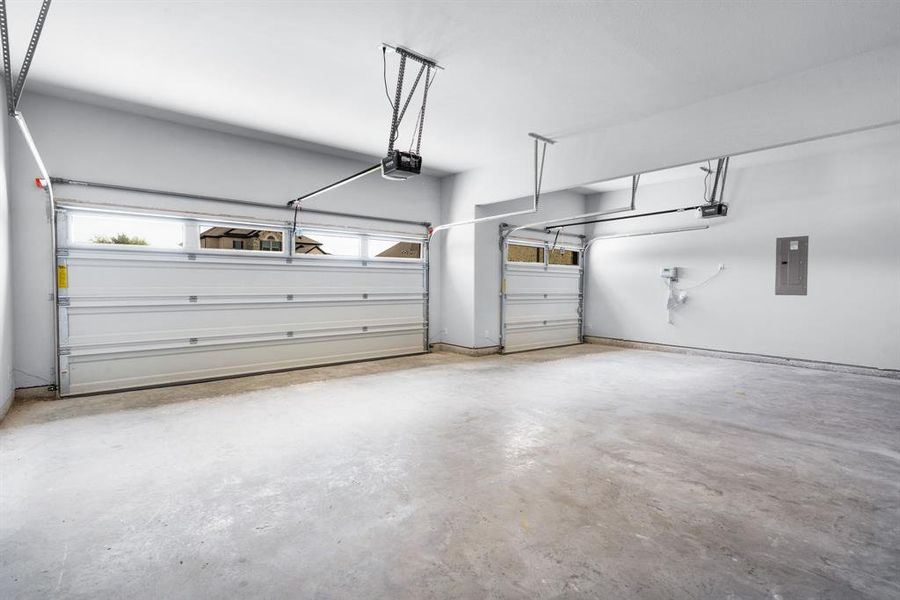 3-Car Garage with garage door openers and tankless water. 3-Car Garage with garage door openers and tankless water.