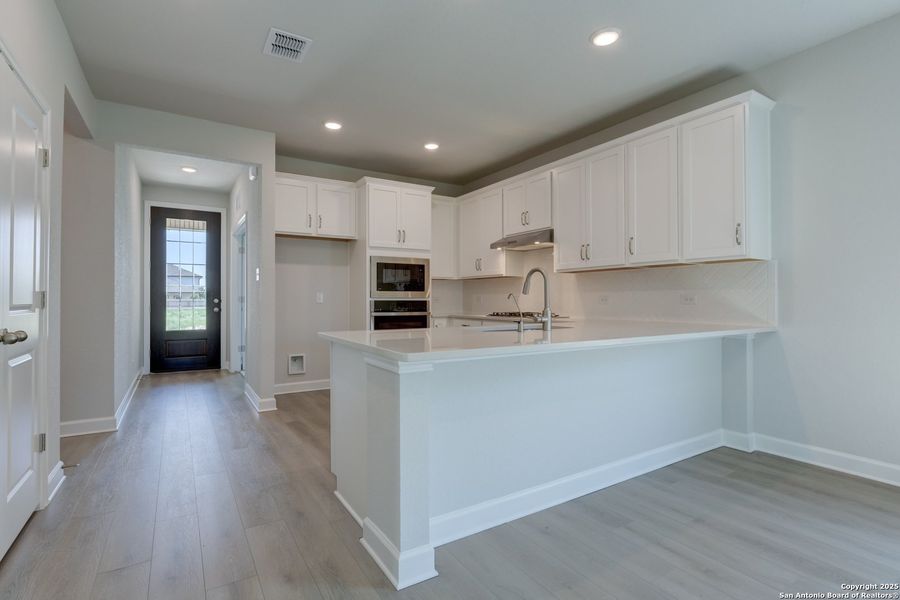 Furnished interior view inside a new home in Enclave at Hennersby Hollow 50's, San Antonio (Image 14). Furnished interior view inside a new home in Enclave at Hennersby Hollow 50's, San Antonio (Image 14).