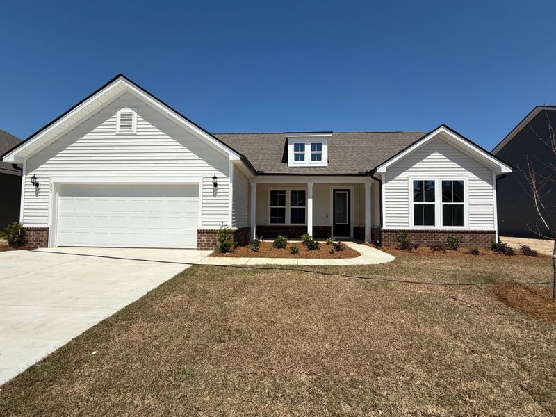 Front exterior of a new home in Del Webb North Myrtle Beach, Myrtle Beach, SC, highlighting curb appeal (Image 22).