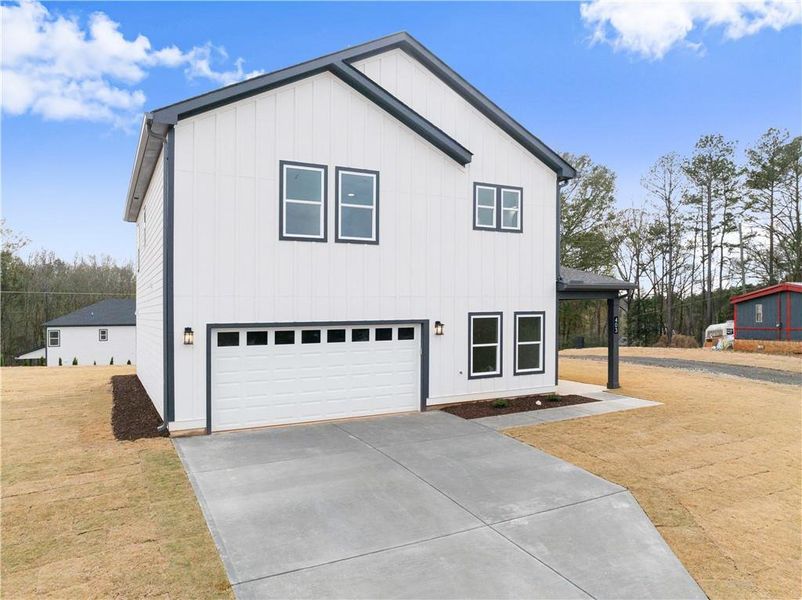 Front exterior of a new home in , Jefferson, GA, highlighting curb appeal (Image 26).