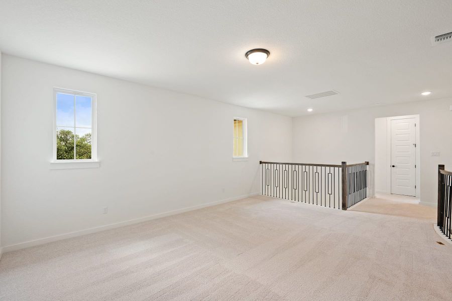 Spacious, unfurnished interior of a new home in Wolf Ranch, Georgetown (Image 43).