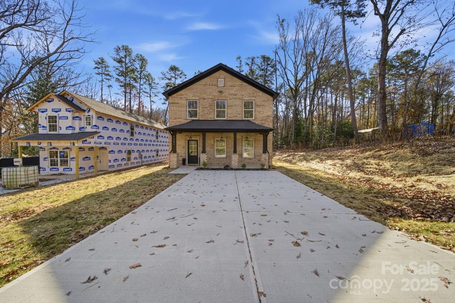 Front exterior of a new home in , Albemarle, NC, highlighting curb appeal (Image 2).