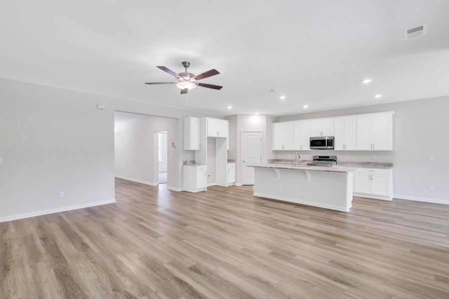 Representative unfurnished interior of a home built from the The Dublin by Smith Family Homes in Settlers Hammock, Kingsland (Image 11).