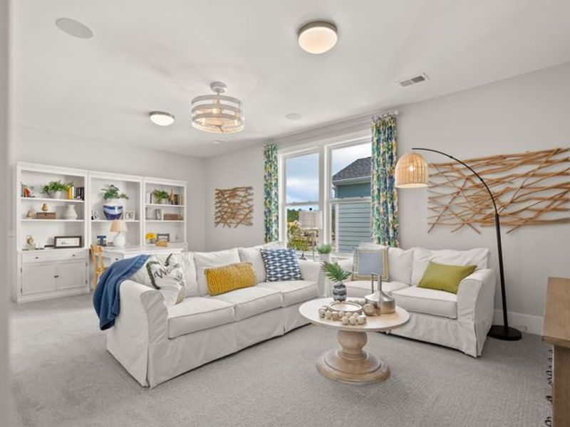 Representative furnished interior of a home built from the Sinclair P by True Homes in Homecoming, Ravenel (Image 12).