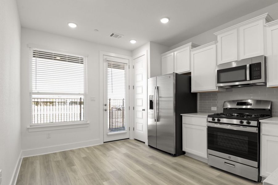 Furnished interior view inside a new home in Center 45, Round Rock (Image 5).