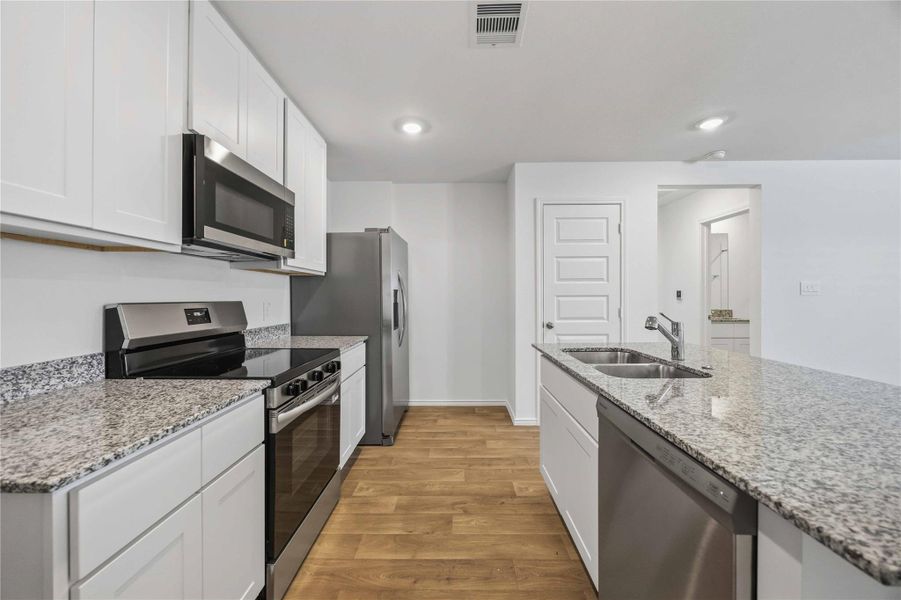 Furnished interior view inside a new home in Garver Heights, Houston (Image 8).