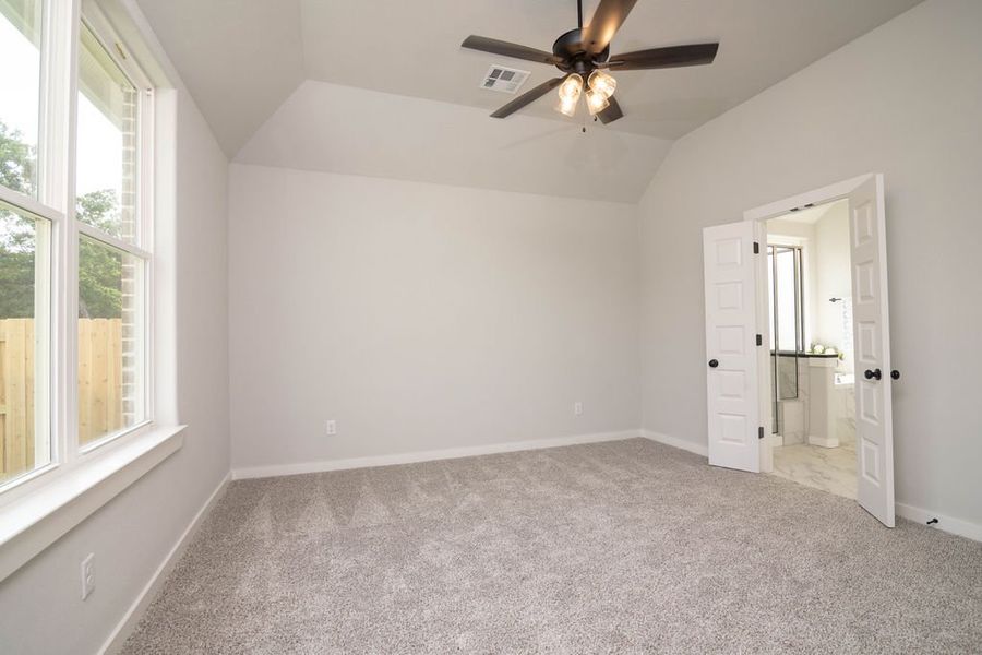 Representative unfurnished interior of a home built from the The Laurel by Avonley Homes in Greens Prairie Reserve, College Station (Image 21).