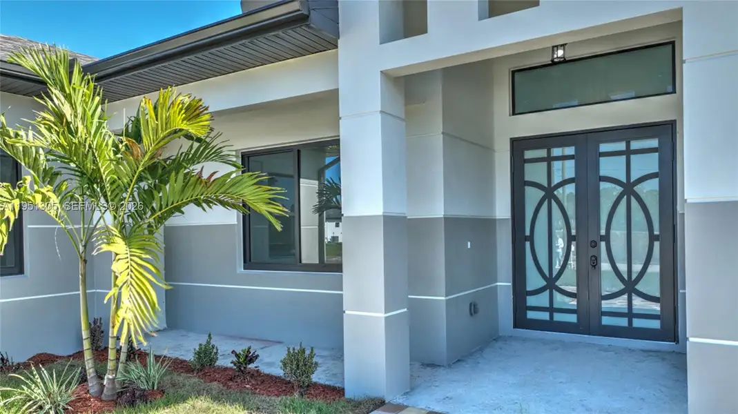 Exterior details and patio area of a home in , Lehigh Acres (Image 4). Exterior details and patio area of a home in , Lehigh Acres (Image 4).