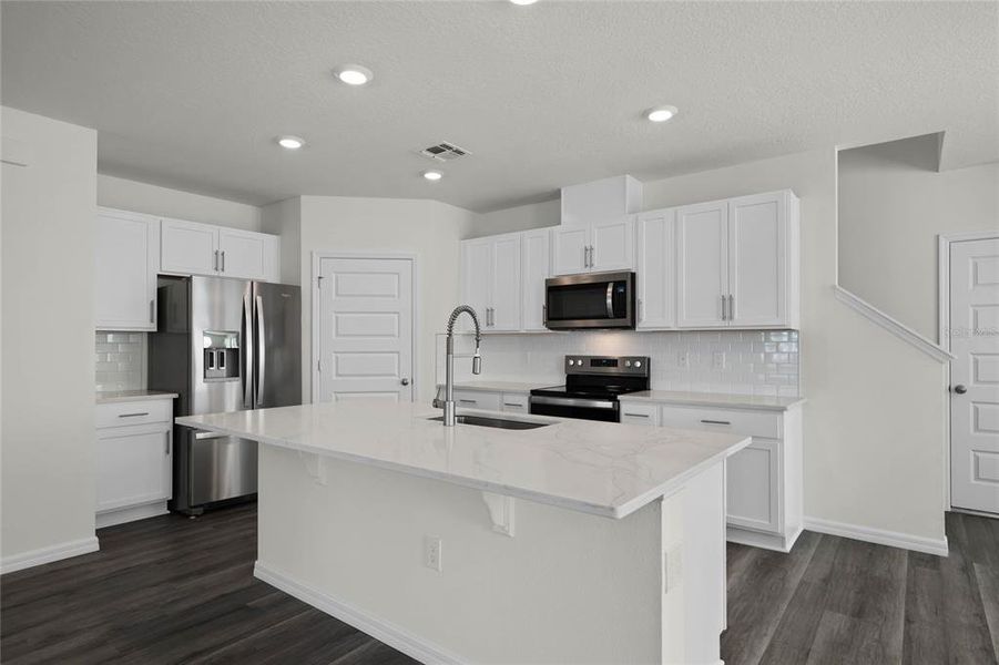 Furnished interior view inside a new home in , Winter Haven (Image 3). Furnished interior view inside a new home in , Winter Haven (Image 3).