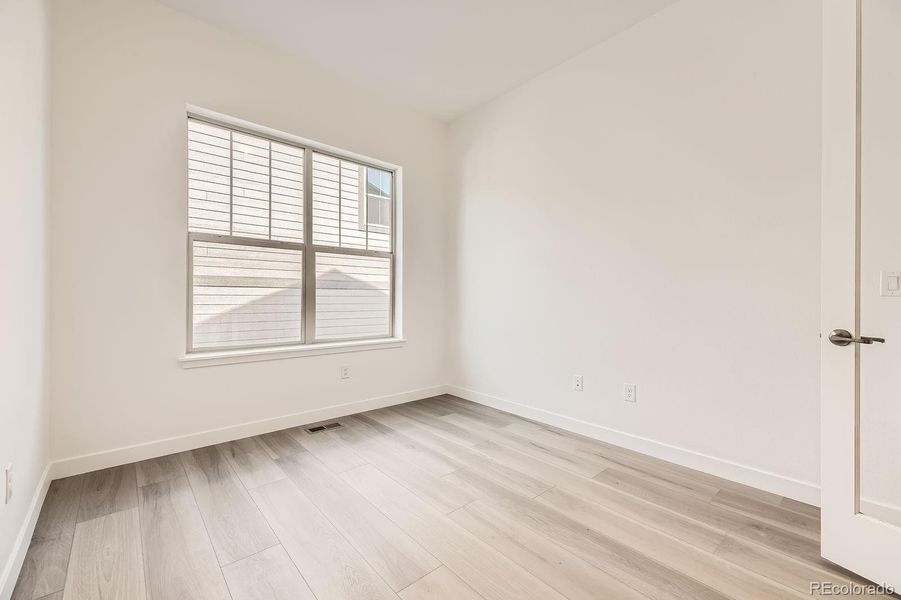 Spacious, unfurnished interior of a new home in Red Rocks Ranch: The Grand Collection, Morrison (Image 10).