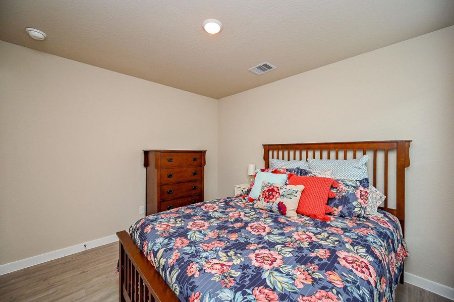 Furnished interior view inside a new home in Mustang Crossing, Alvin (Image 12).