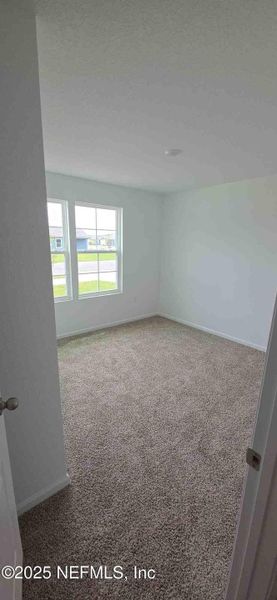 Spacious, unfurnished interior of a new home in The Arbors, Jacksonville (Image 25).