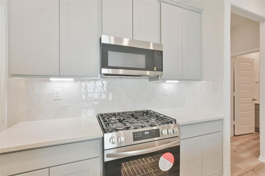 Furnished interior view inside a new home in Lakes at Black Oak, Magnolia (Image 42).
