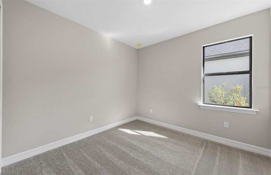 Spacious, unfurnished interior of a new home in The Strand at Cedar Grove, North Port (Image 29).