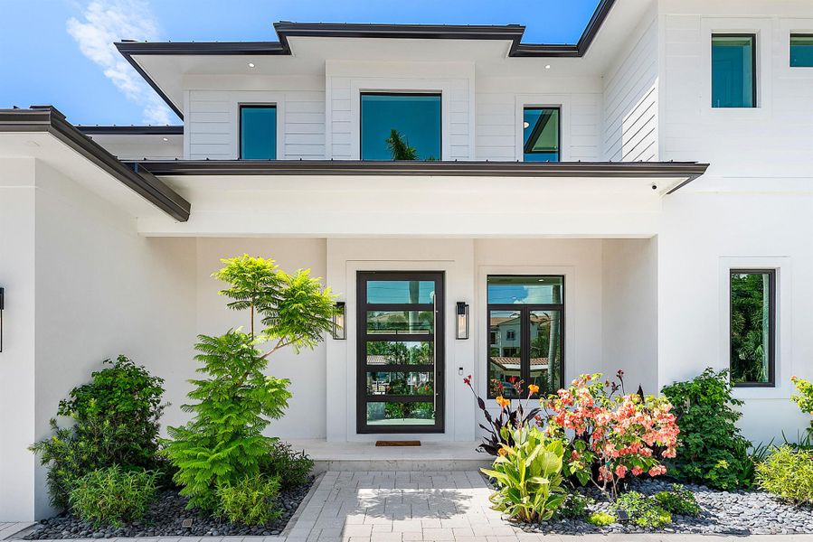 Exterior details and patio area of a home in , Delray Beach (Image 38).