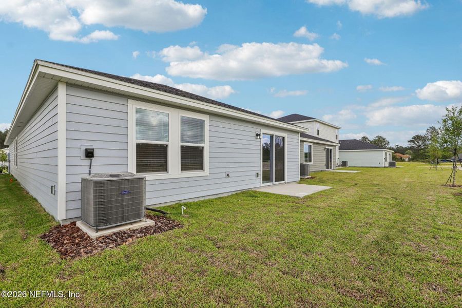 Exterior details and patio area of a home in Kings Preserve, Jacksonville (Image 3).