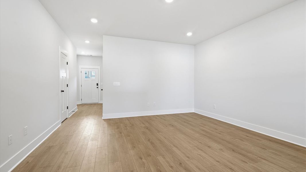 Hardwood flooring and high standards define this vibrant family room ideal for everyday living at Saluda Crossing Hardwood flooring and high standards define this vibrant family room ideal for everyday living at Saluda Crossing