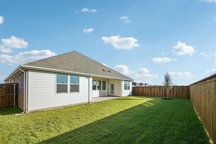 Exterior details and patio area of a home in Lakehaven - Premier Series, Farmersville (Image 22).