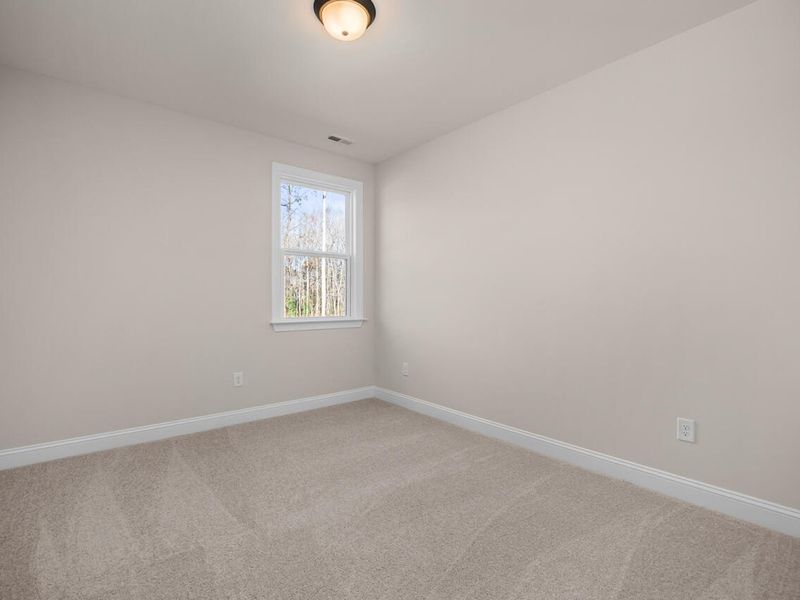 Spacious, unfurnished interior of a new home in Laneridge Estates, Raleigh (Image 26).