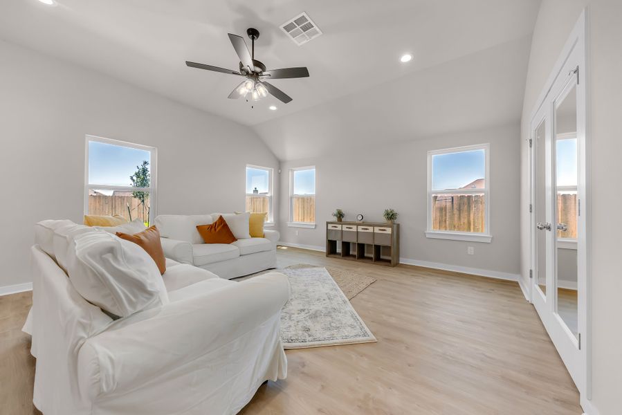 Representative furnished interior of a home built from the The Poppy by Avonley Homes in Rudder Pointe, Bryan (Image 16).