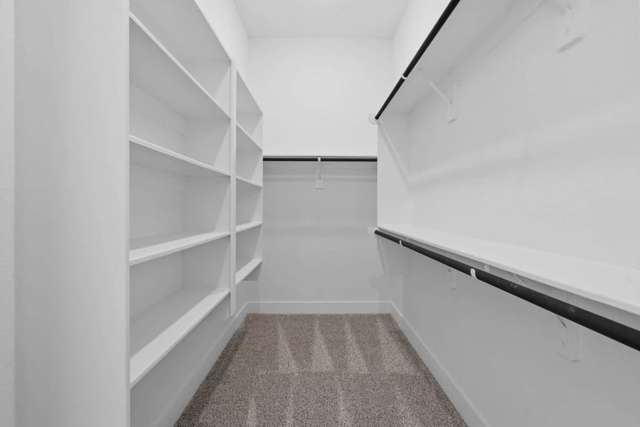 Representative unfurnished interior of a home built from the Palmer by Chesmar Homes in Riceland Alley Loads, Mont Belvieu (Image 28).