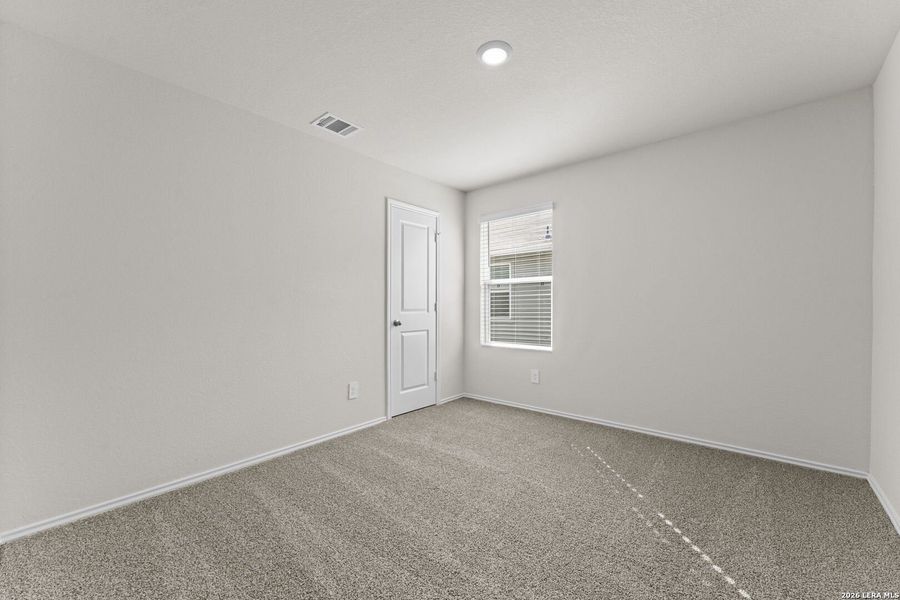 Spacious, unfurnished interior of a new home in Navarro Fields, Seguin (Image 12).